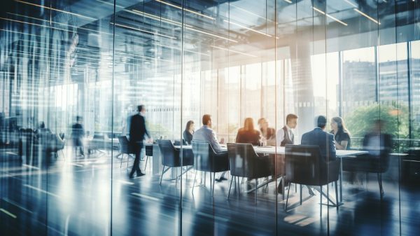 Blurred business people meeting in modern office building conference room