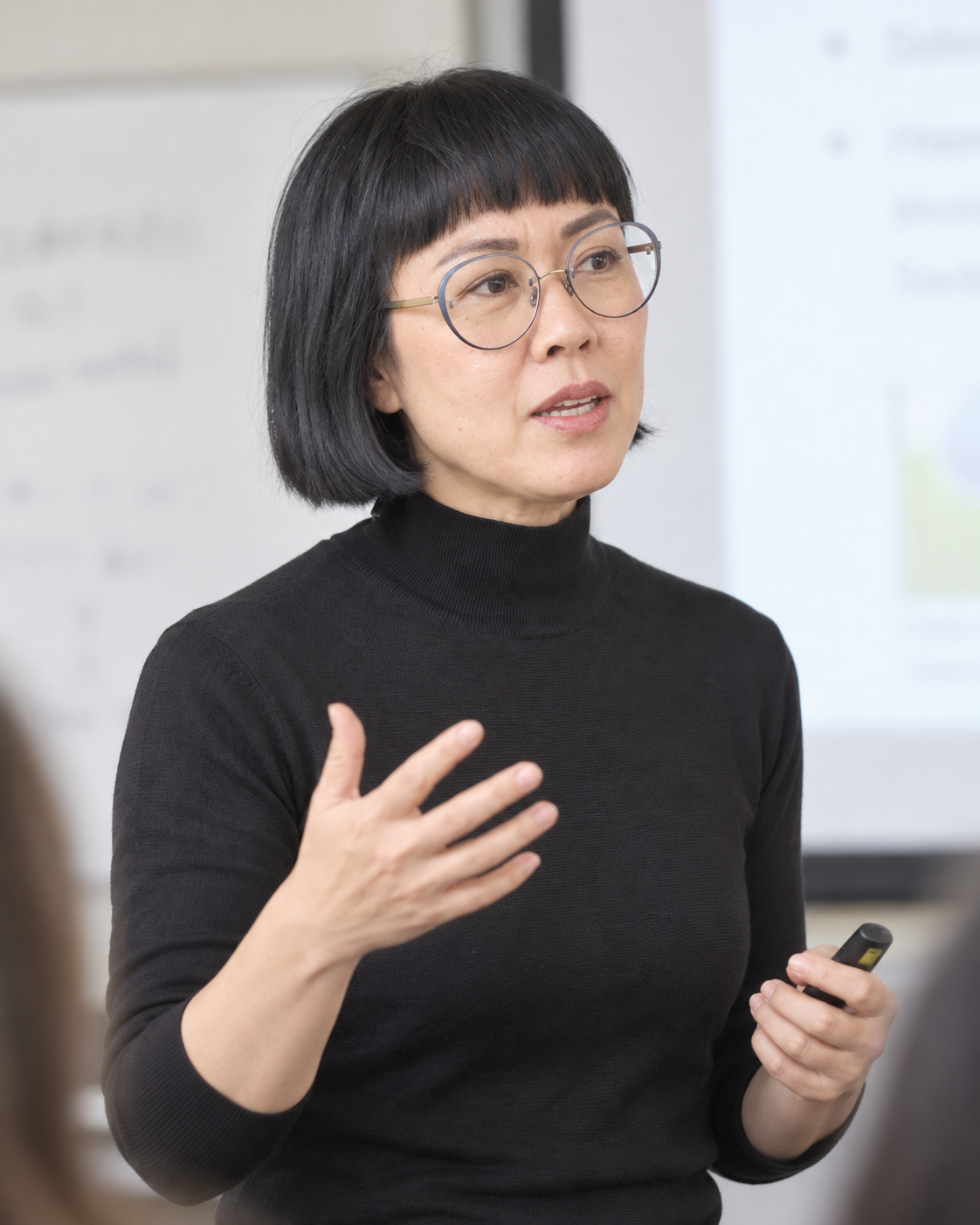 Mabel Leung in discussion during a professional teaching session